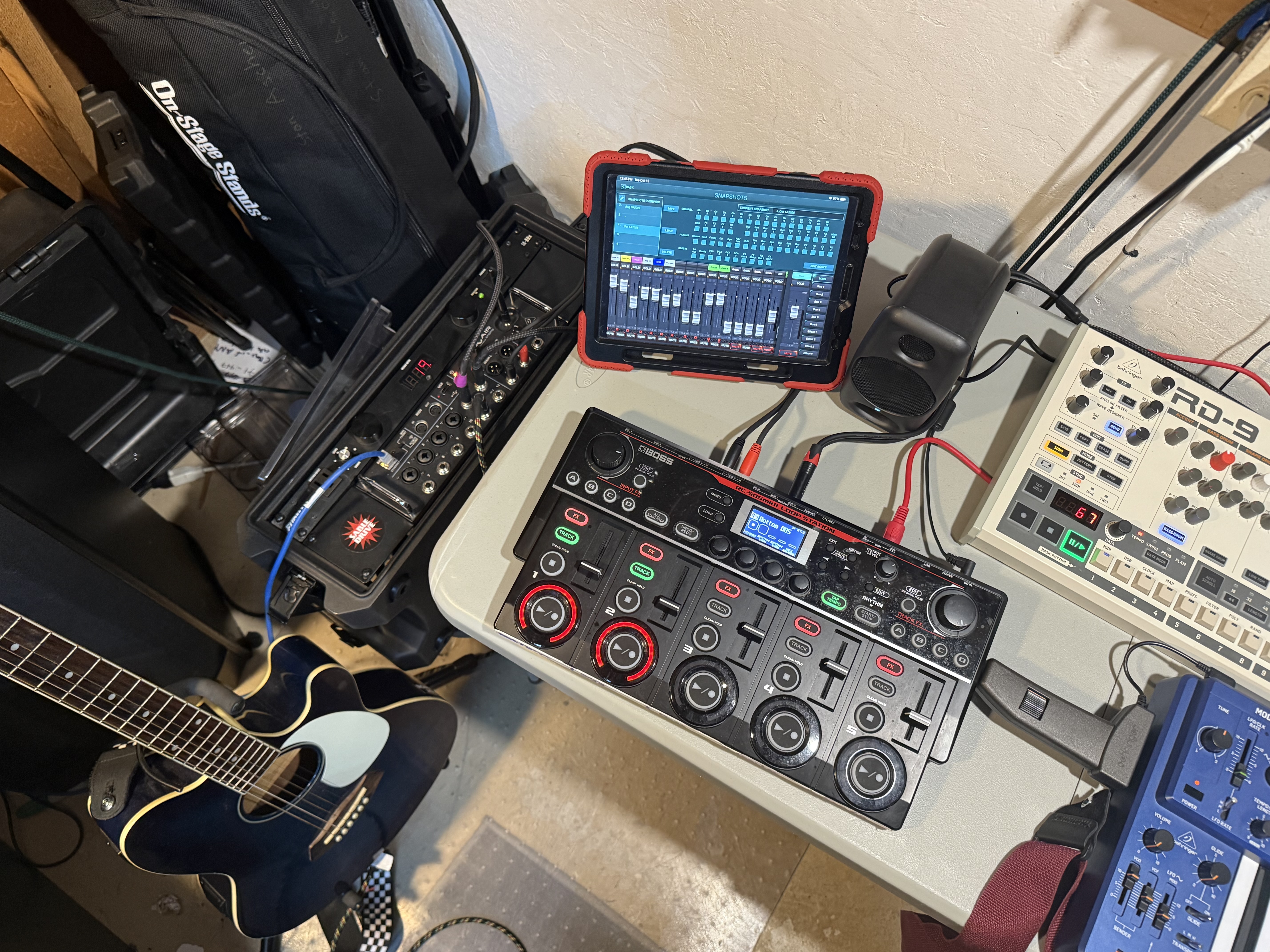 Table with synths and guitat